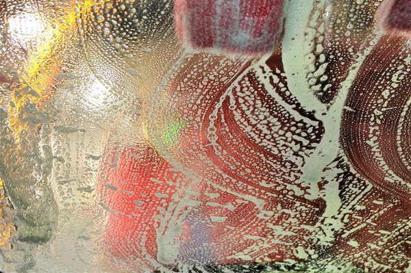 How to apply sustainable urban drainage systems (SUDS) in real estate development to manage stormwater?